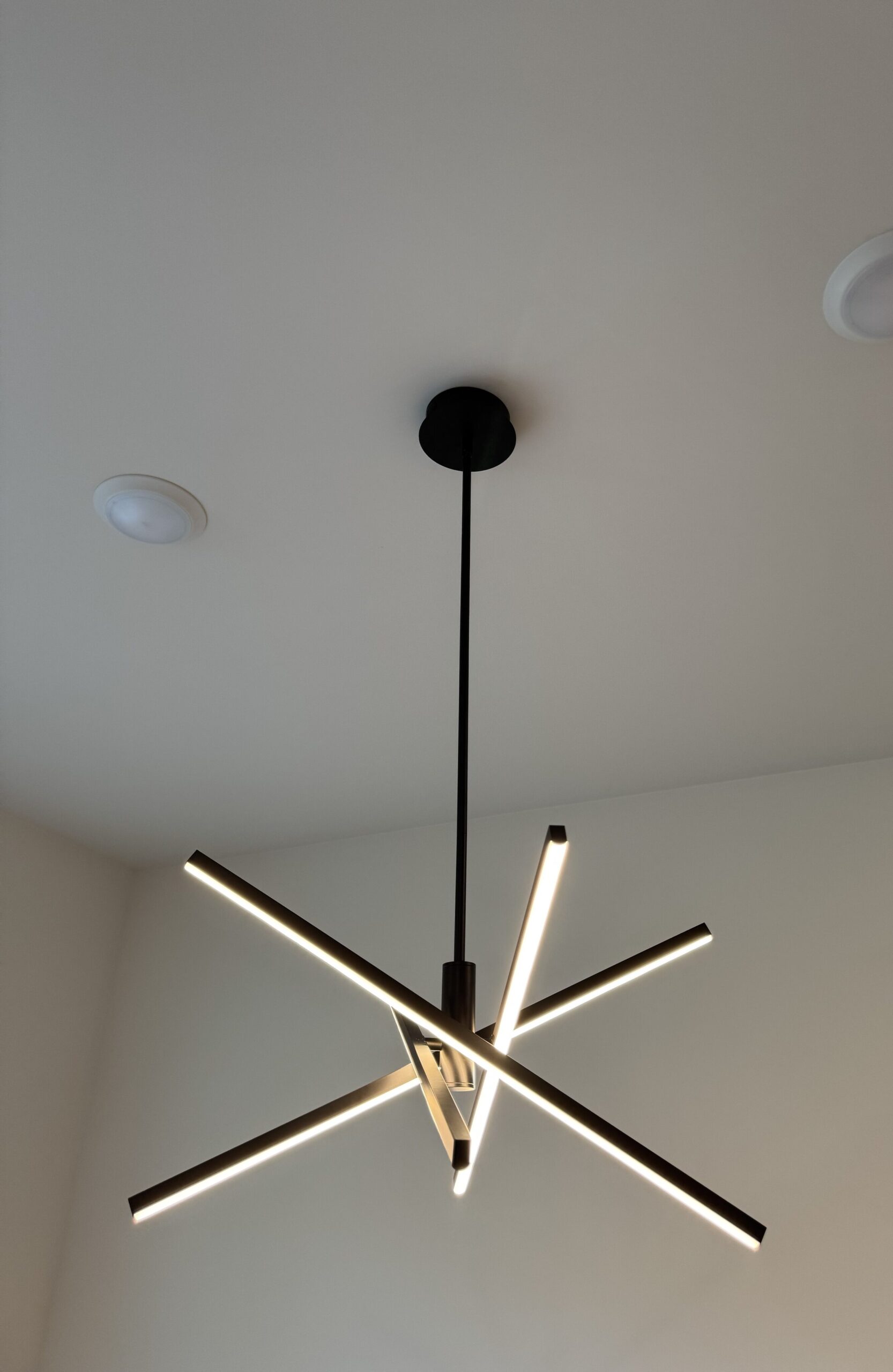 Black multi arm linear LED pendant edited scaled — Spartan Home Pros, Central New Jersey