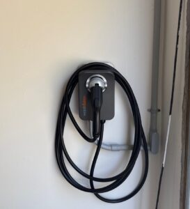 Level 2 EV charger installed in a garage — Spartan Home Pros, serving Readington, NJ