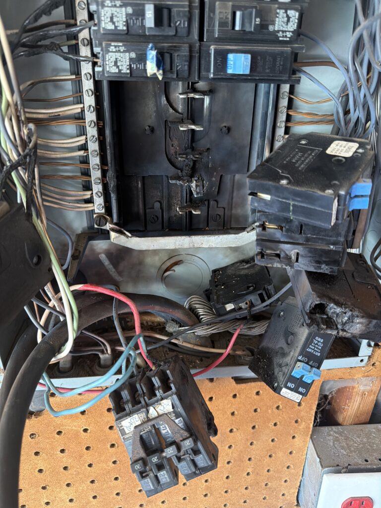 Burned electrical panel found in a New Jersey home