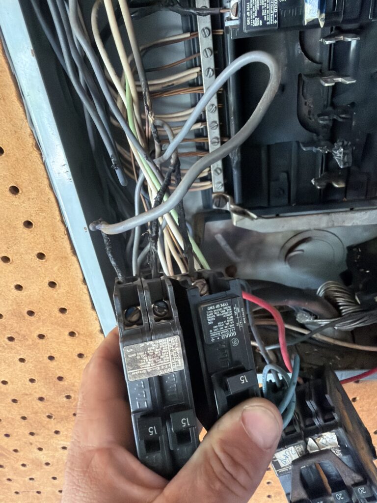 Burned circuit breaker pulled from a New Jersey electrical panel