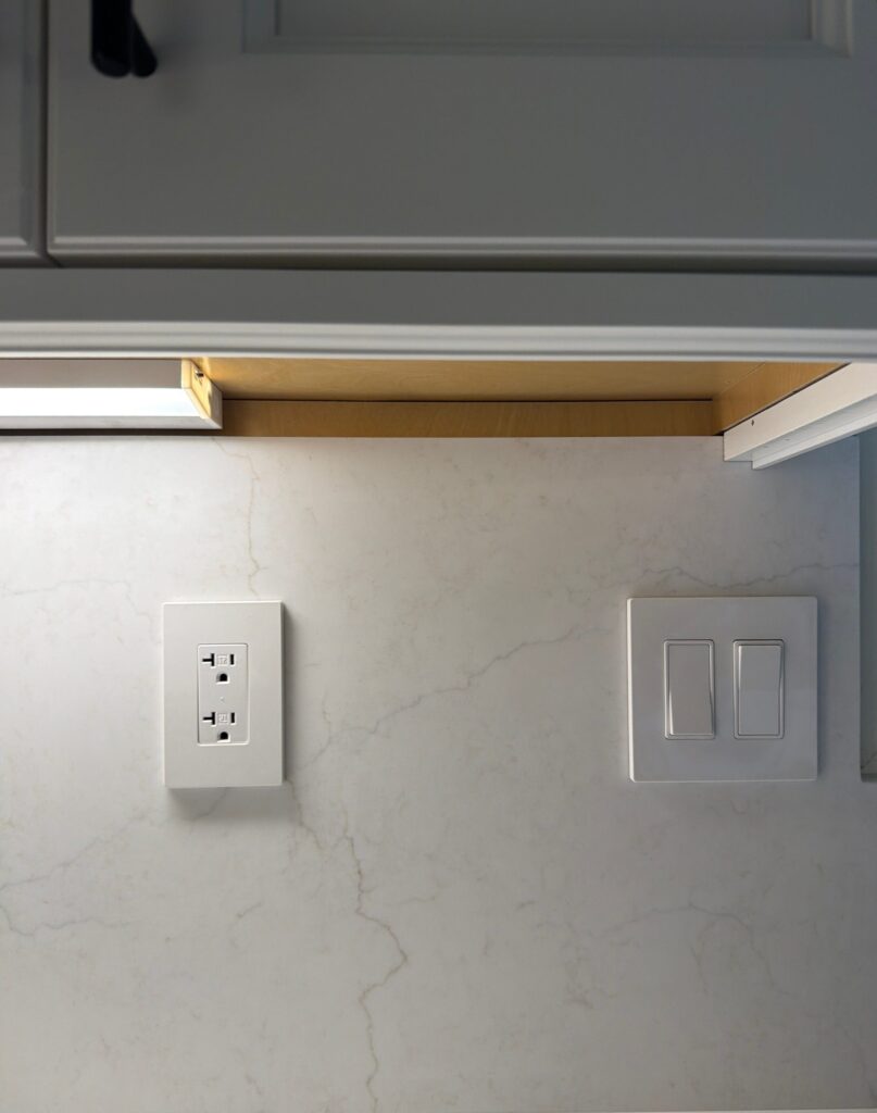 Outlet under kitchen cabinet — Spartan Home Pros, Central New Jersey