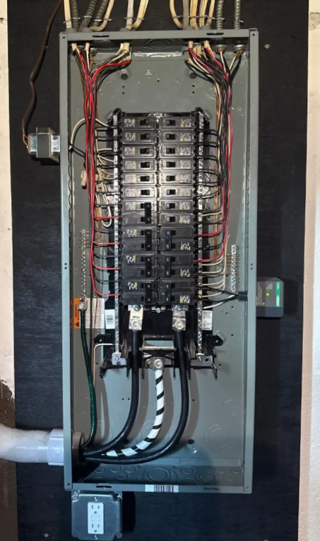 Electric panel upgrade with surge protector by Spartan Home Pros