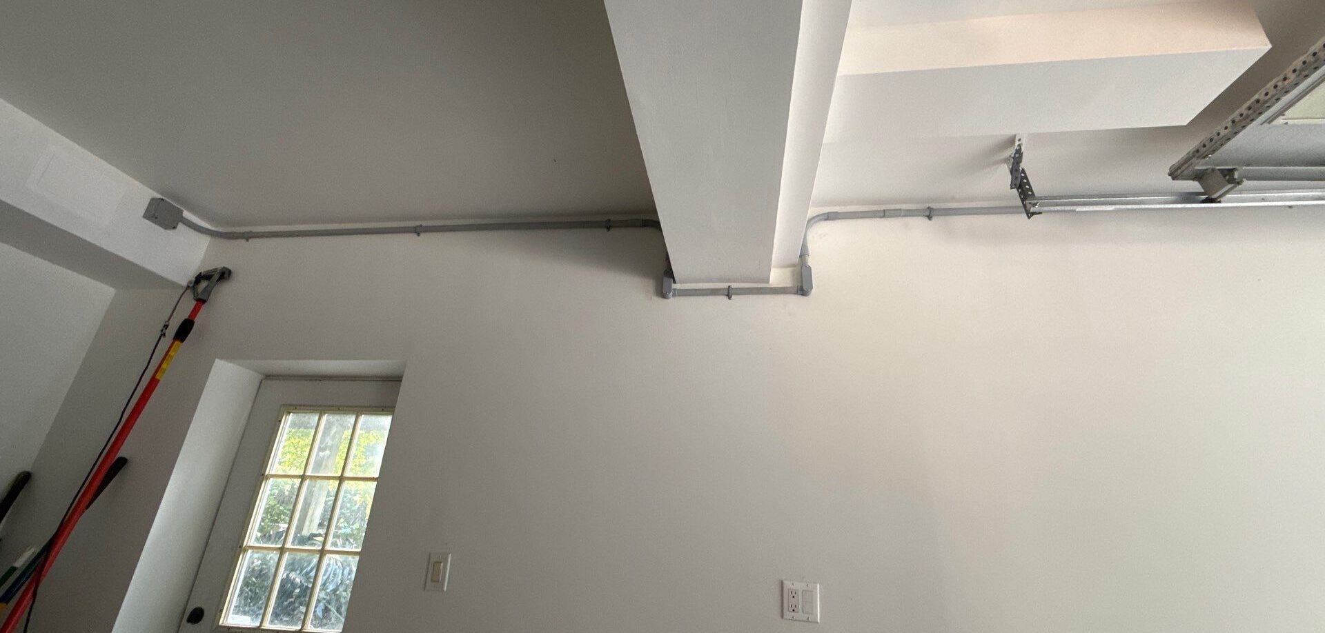 Surface mounted conduit run in — Spartan Home Pros, Central New Jersey
